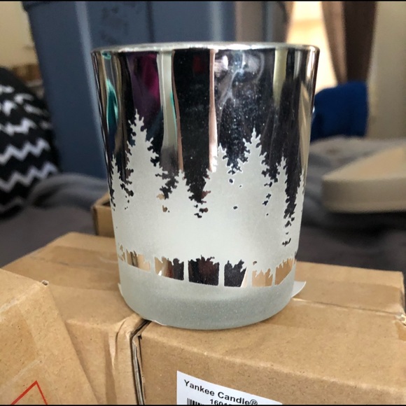 Four-Yankee candle votive silver candle holders